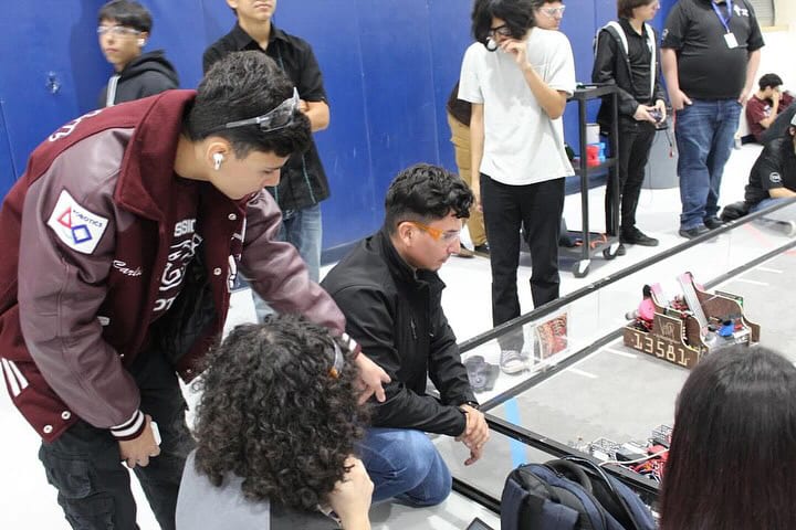 FTC Team 18734 robot on a foam-tile practice field